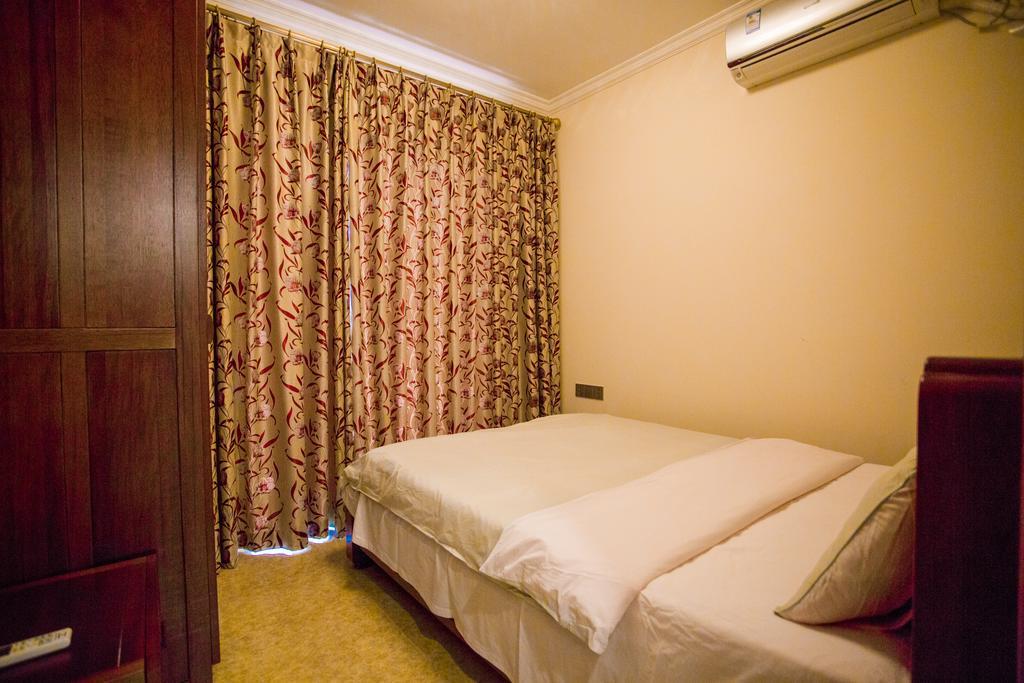 Sanya Chunting Holiday Apartment Quarto foto