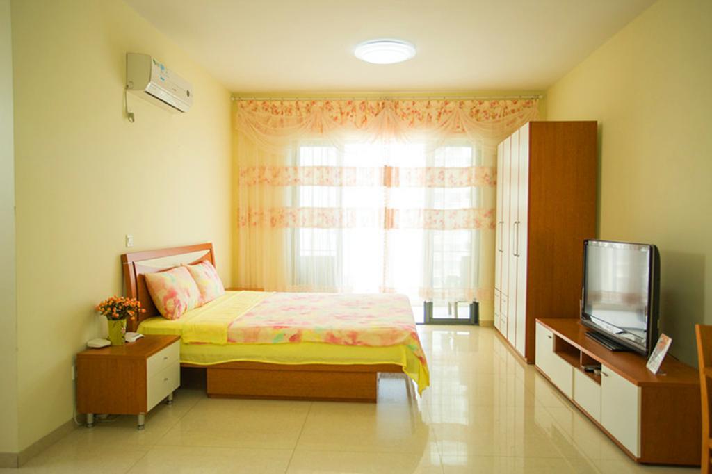 Sanya Chunting Holiday Apartment Quarto foto